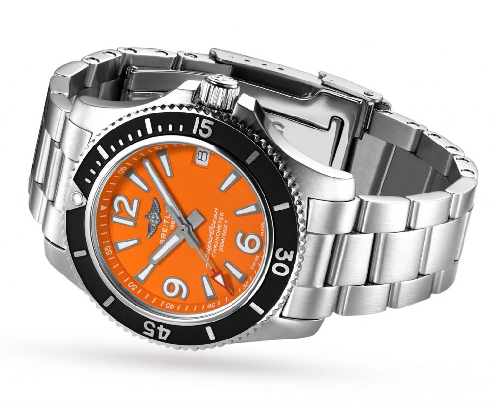 The orange dial fake watch has a date window.