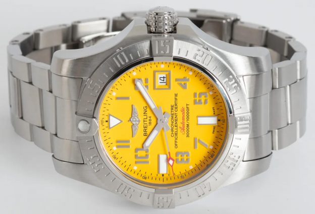 The waterproof fake watch has a yellow dial.